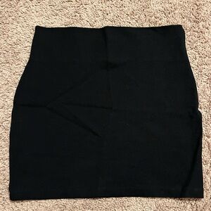 Plain black mini skirt